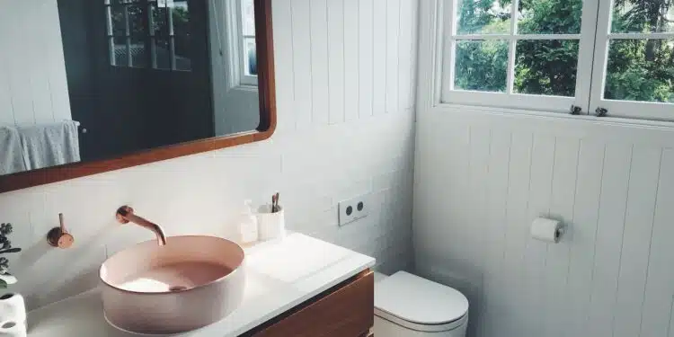 white ceramic sink with stainless steel faucet