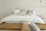 Optimisez votre espace avec un lit coffre : Guide pratique pour une chambre ordonnée et stylée